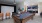 a clubroom with a pool table and chairs
