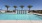 a pool with palm trees
