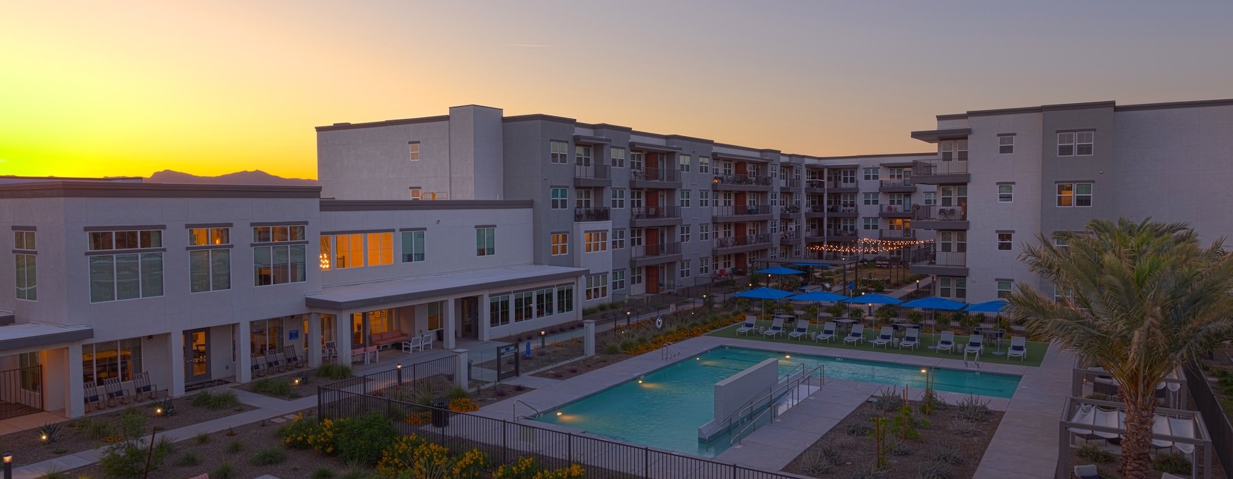 a building with a pool in front