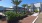 a courtyard with trees and plants